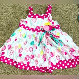 Baby Beri girls size 6/9 months birthday balloon dress with ribbon appliqué.
